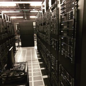 Aisle of server racks in a Los Angeles data center maintained by A&G